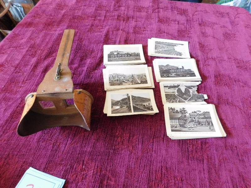 lot 21 image: Antique stereoscope viewer as is and stereoscope cards plus photos...see photos