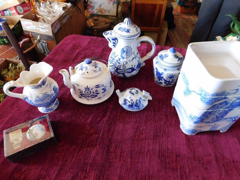lot 24 image: many blue and white pieces some may be ceramic or china