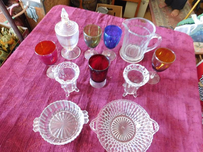 lot 29 image: lot of glass items serving and drink ware both clear and colored