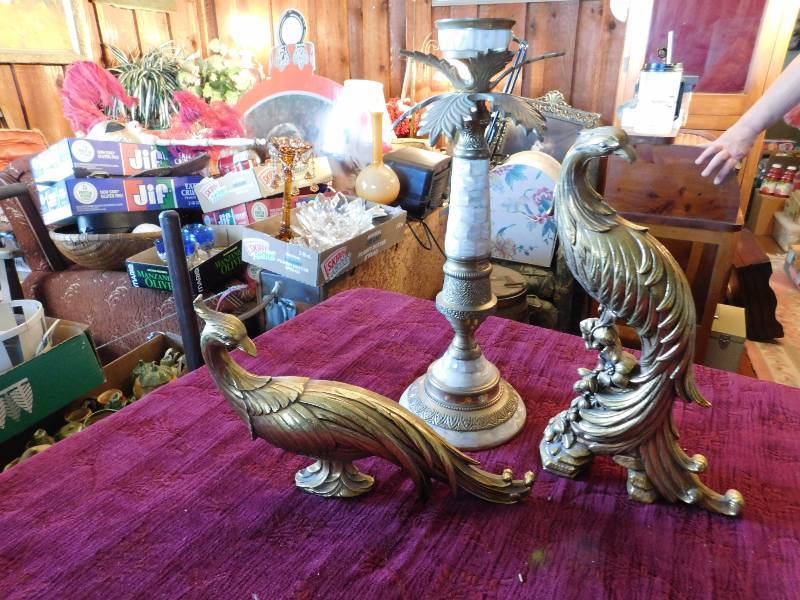 lot 32 image: Vintage home decor items two brass peacocks and candlestick