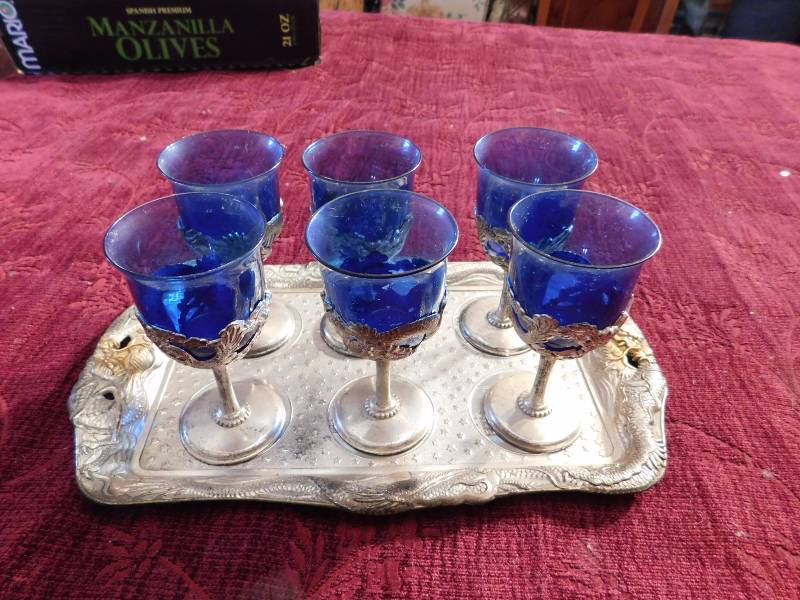 lot 43 image: vintage silver and gold tone tray with silver tone stems and blue glass inserts