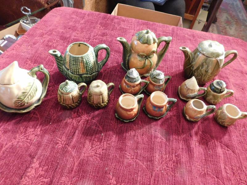 lot 51 image: Asian tea pots and tea cups some with lids some match