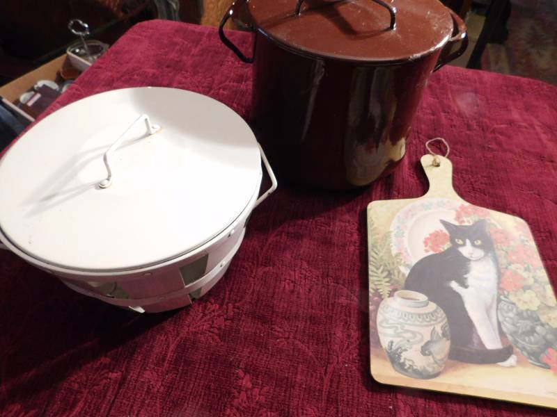lot 52 image: large brown Dansk stock pot with lid metal basket and wall art