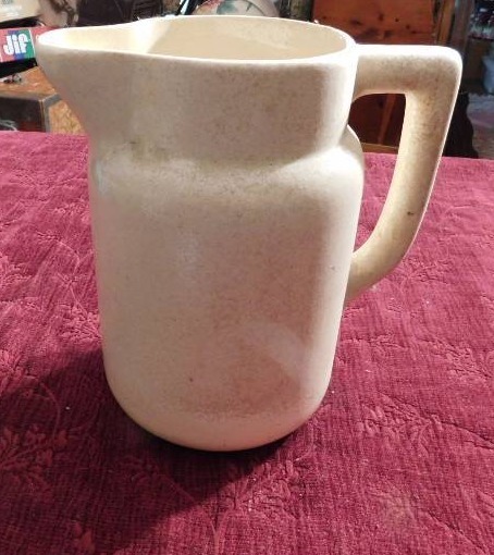lot 57 image: unmarked white stoneware pitcher