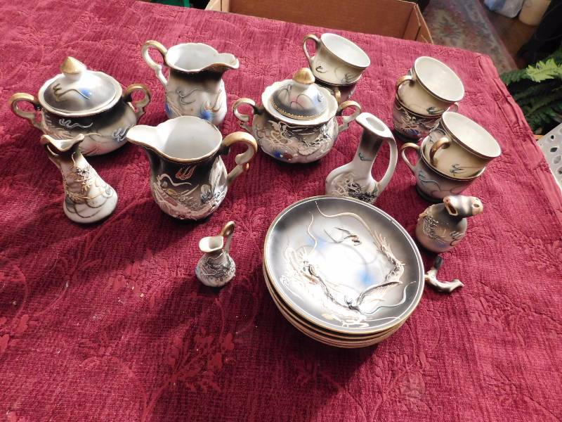 lot 61 image: Vintage Nikoniko Sterling China Black Moriage Dragon lithopane Tea Set pieces