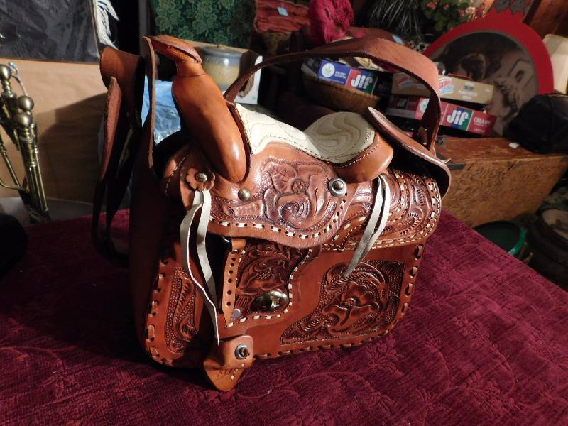 lot 62 image: vintage saddle purse received as a gift never used so it is new to you