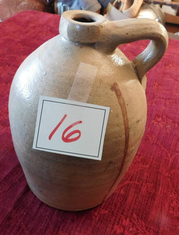 lot 16 image: tan and brown jug unmarked please see photos