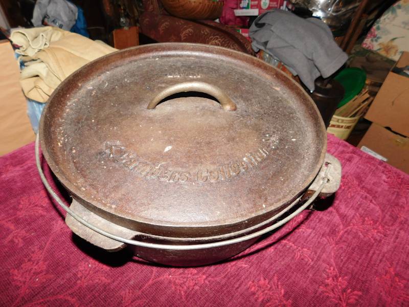 lot 19 image: large cast iron dutch oven with handle campers collection