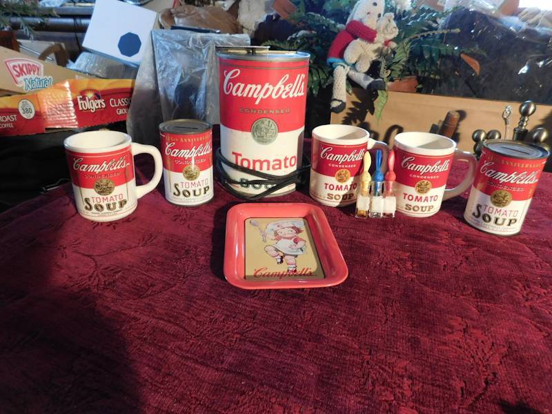 lot 64 image: Campbells soup lot Dazey Campbells soup can opener, mugs tin and more