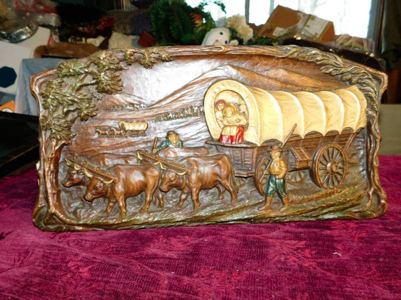 lot 66 image: vintage wall plaque relief of a Conestoga wagon traveling west across America