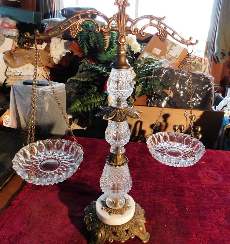 lot 70 image: tall glass and metal scale