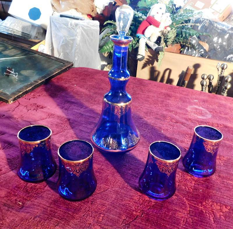 lot 71 image: large blue decanter and 4 matching glasses unmarked