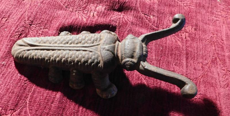 lot 117 image: vintage cast iron beetle boot jack