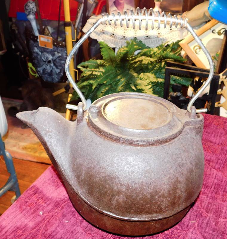 lot 119 image: vintage cast iron tea pot kettle with handle