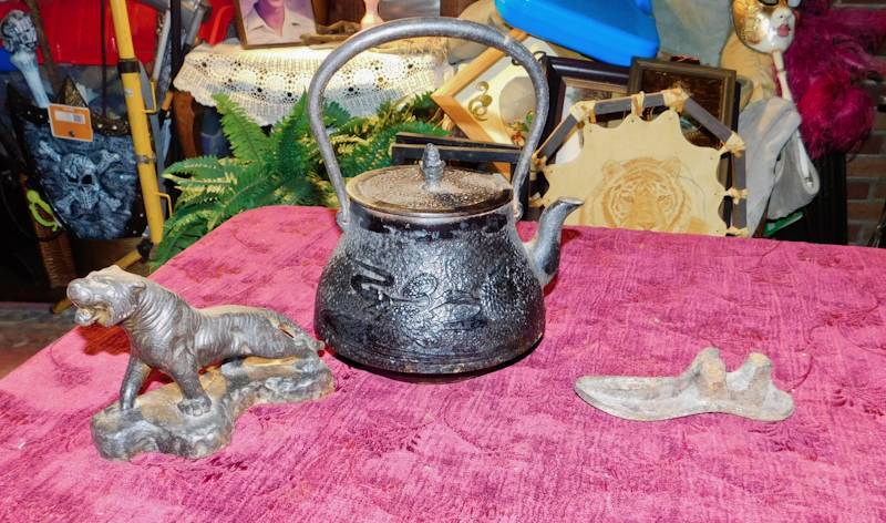 lot 122 image: Asian style cast iron kettle,cat iron shoe form foot and metal tiger
