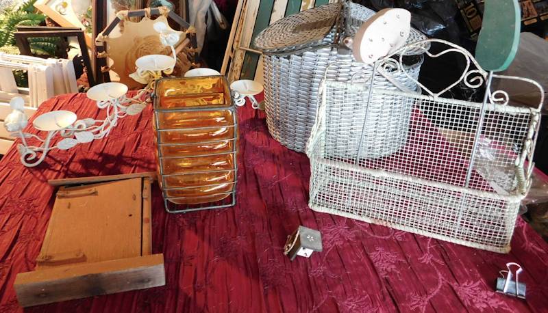 lot 131 image: lot of baskets a couple are metal, the largest one with two lids and handle is metal