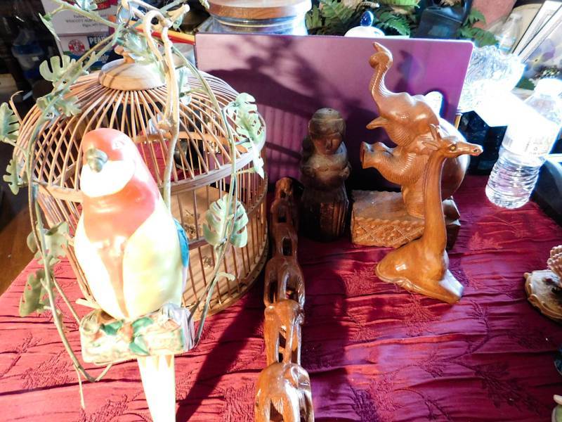lot 180 image: wooden bird cage bird and other African animals see photos