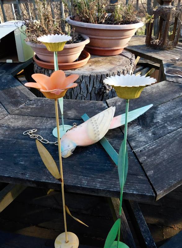 lot 192 image: three colorful metal stands and hanging wooden bird