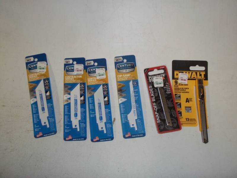 4 New Reciprocating saw blades and snap off blades