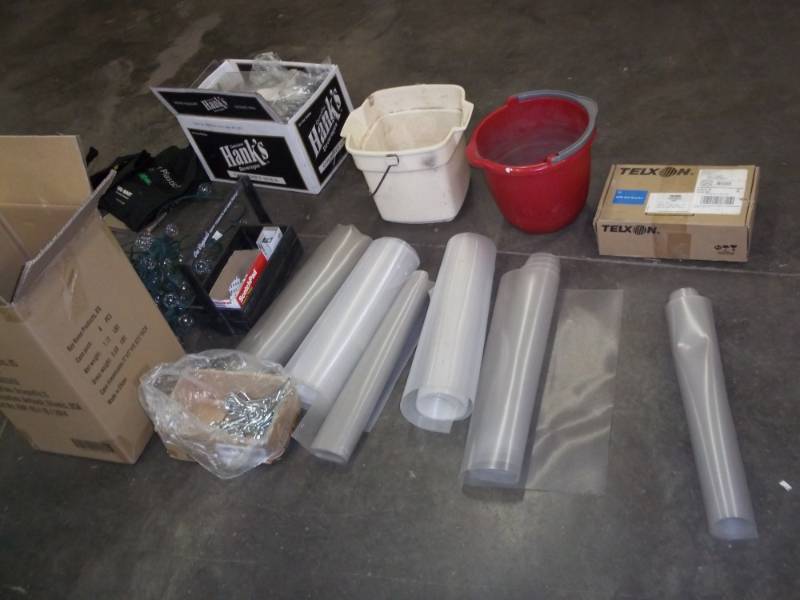 Shelving pads, new paint can openers, Credit card machine, 2 cleaning buckets, Christmas lights,  and light bulbs