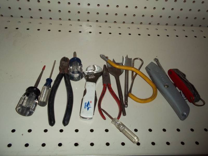 Lot of tools with utility knife and Swiss army knife