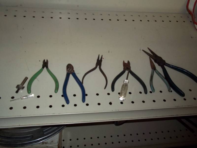 lot of tools with needle nose pliers