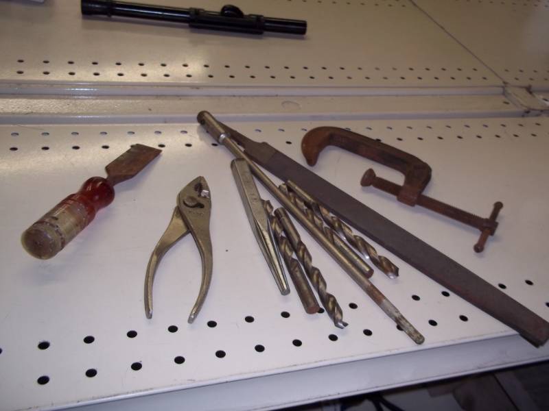 lot of tools with c clamp and drill bit extension