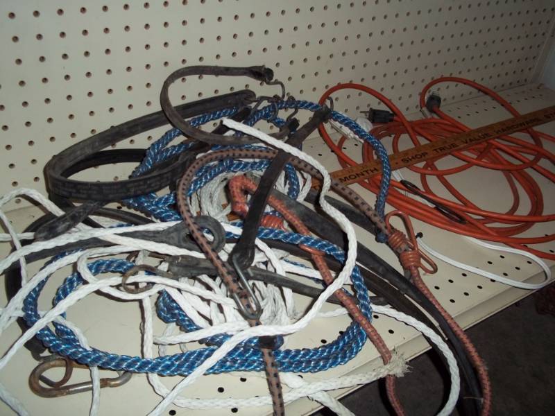 Lot of rope and bungee cords with and extension cord