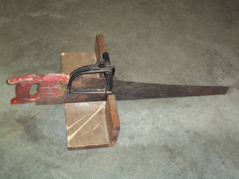 Vintage miter box with saw