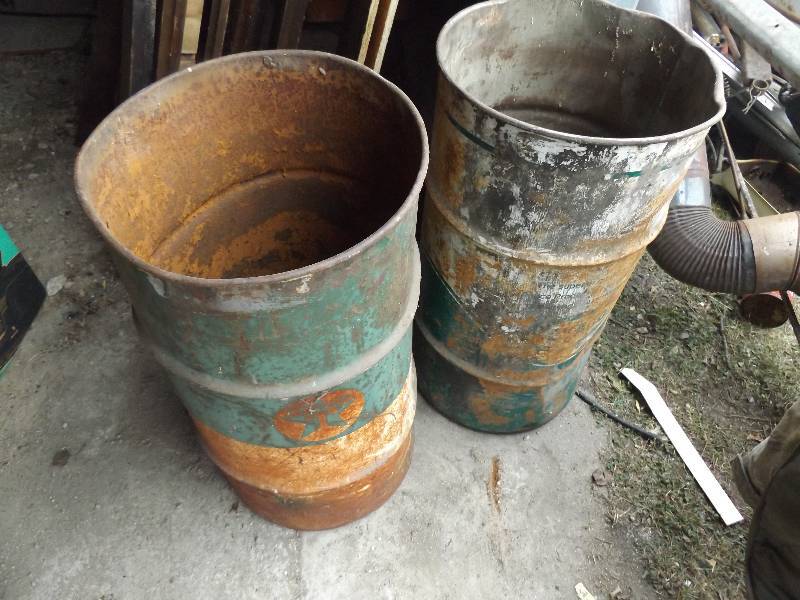 Two Metal Barrels and old Cordless Telephone