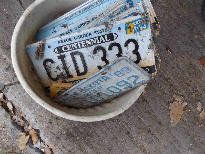 Pail of License Plates