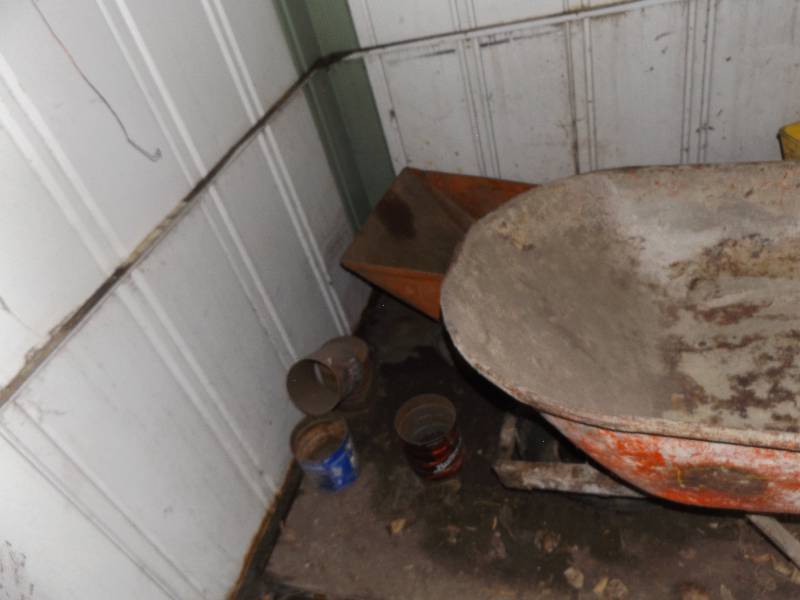 Wheelbarrow and seed spreader