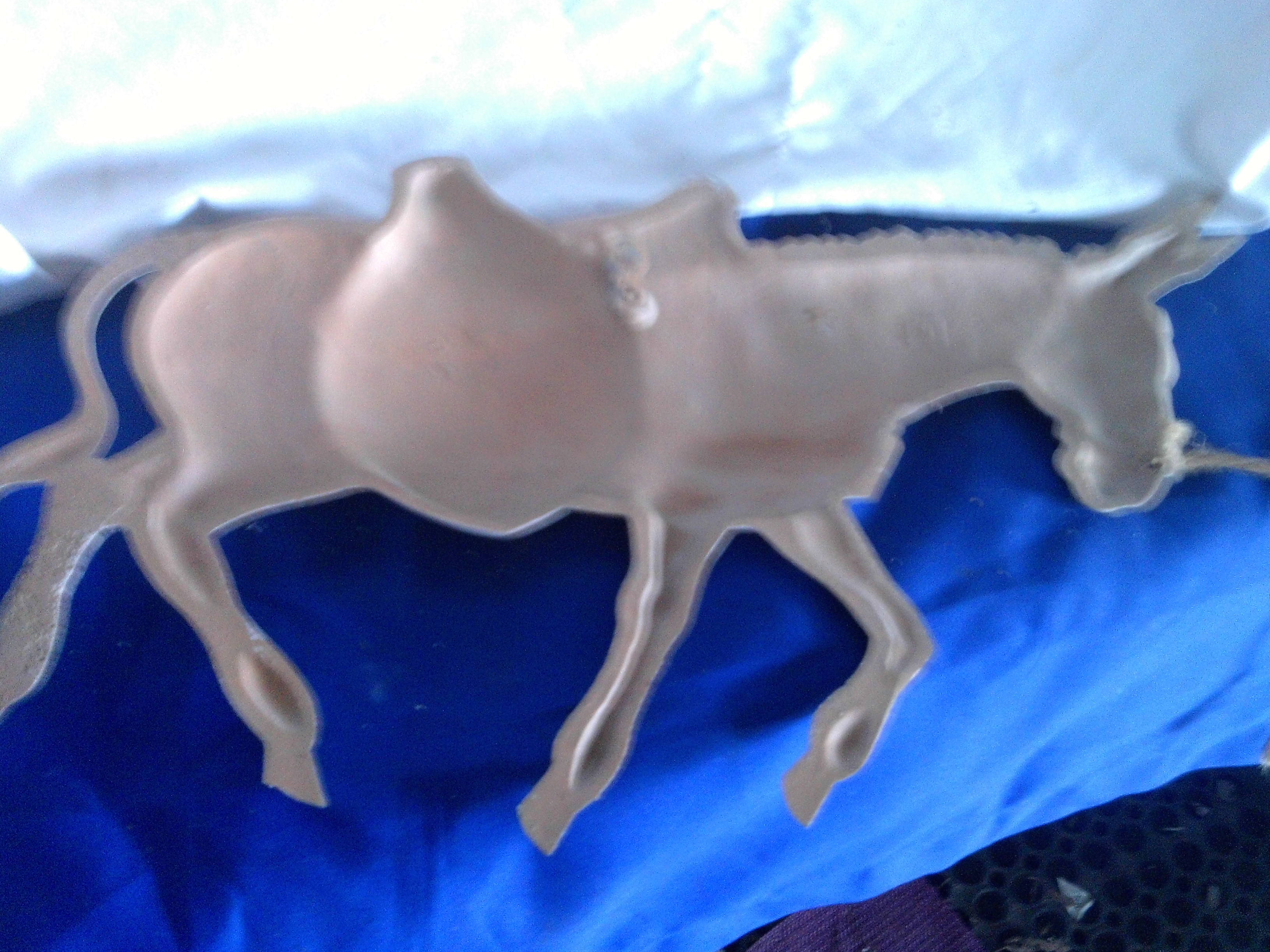 vintage metal pack mule wall hanging