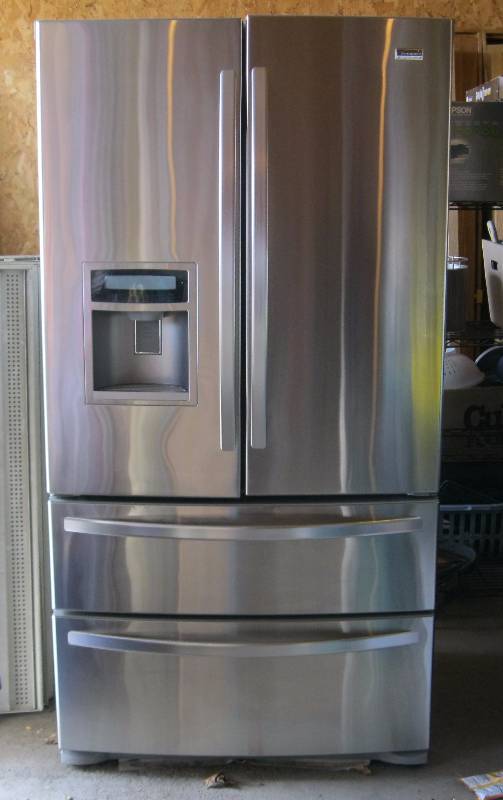 lot 5 image: Kenmore Elite French Door Refrigerator With Double Freezer.This Is Top Of The Line It Has Everything Water, Ice, Filter. 25Cu Ft. Original Price Was $3200. Has Some Light Wear And A Few Marks, But In Otherwise Good Condition. 69.5H x 36W x 31D