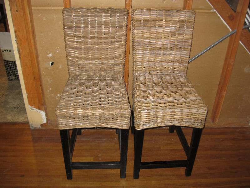 lot 9 image: Pair Of Tall Wicker And Wood Chairs. Some Wear.