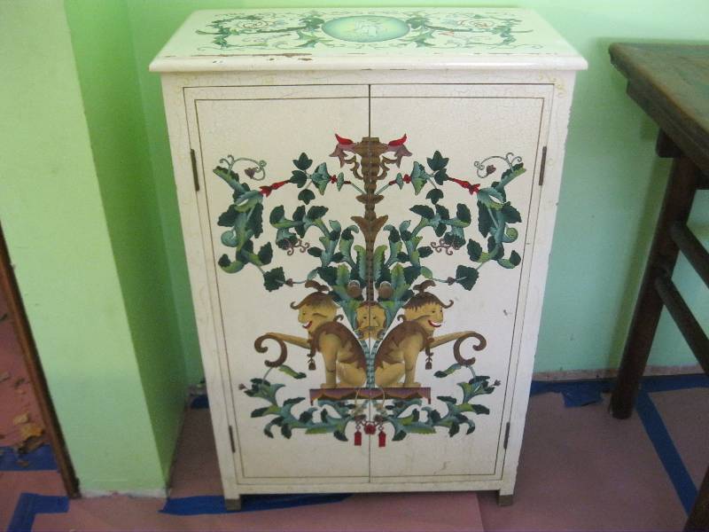 lot 13 image: Painted Ornate Cabinet. Brass Foot Covers. Has Some Wear. 36x24x12