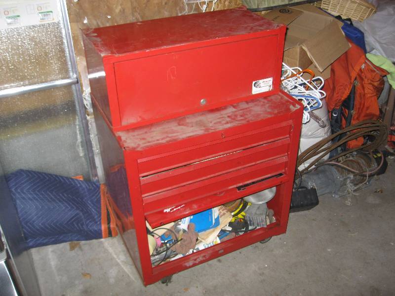 lot 28 image: Tool Box Chest With Contents Some New. One Wheel Needs Repair.
