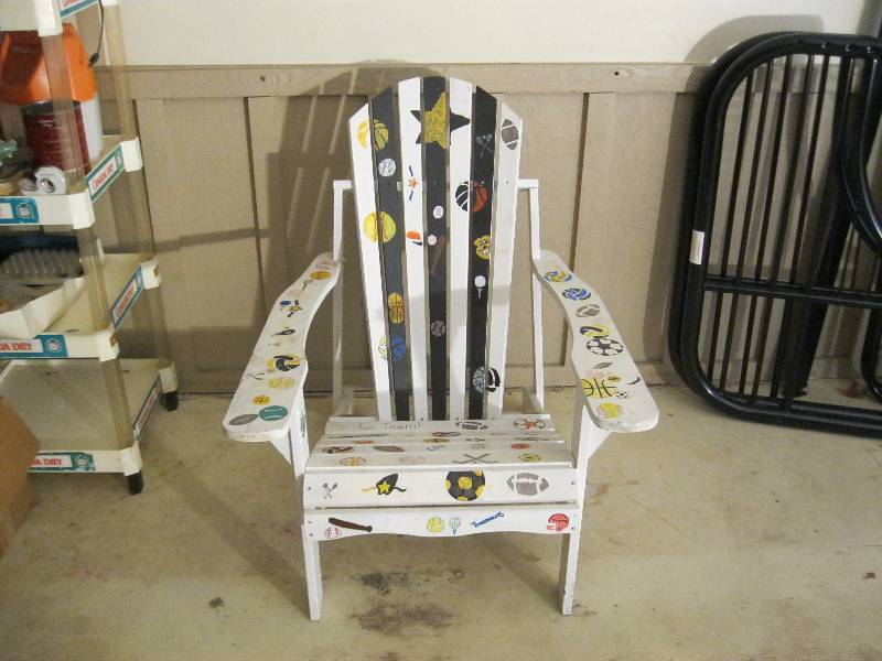 lot 32 image: Wood Adirondack Chair With Writing Decoration.
