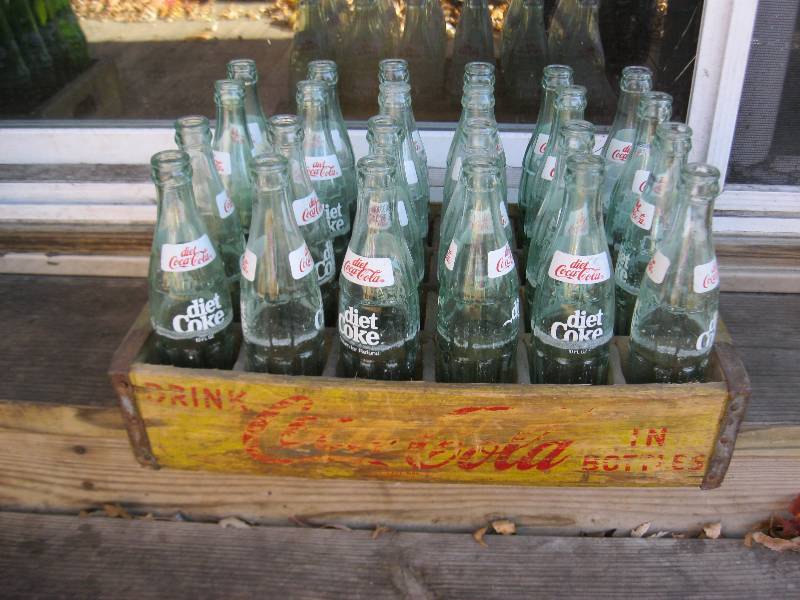 lot 56 image: Vintage Yellow Coke Wood Crate With Bottles.