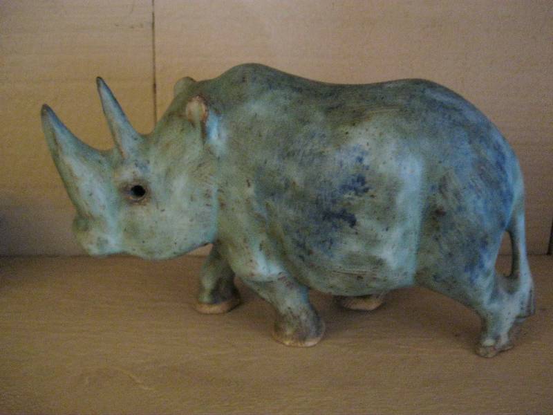 lot 62 image: Teracotta Glazed Rino.