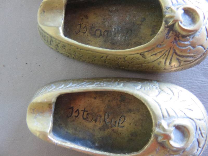 Brass looking shoes and bowl with slotted cover