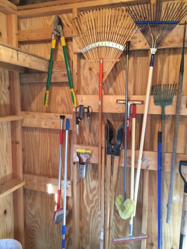 Assorted Yard & Garden tools  the entire wall as seen in the pictures. Great Lot