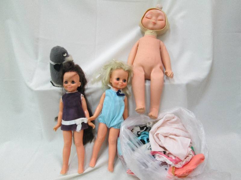 3 dolls and doll clothes, includes ...