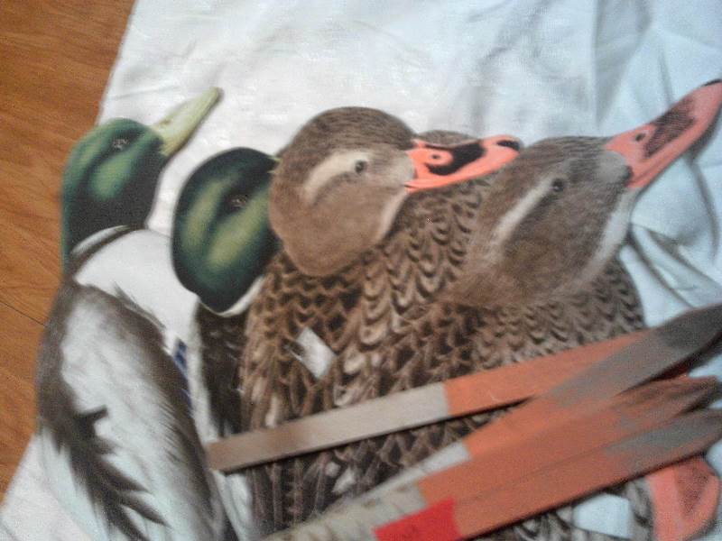 4 duck decoy silhouettes