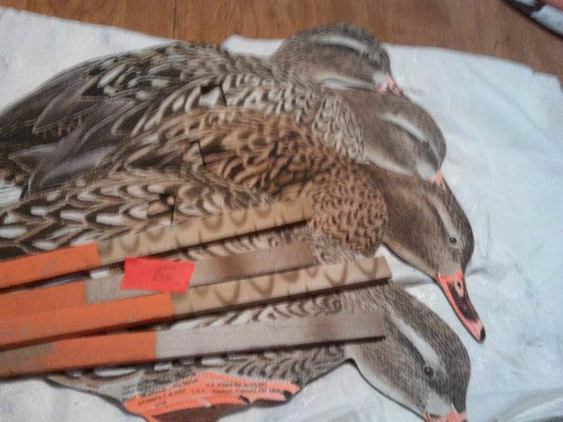 4 duck decoy silhouettes