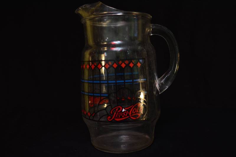 lot 95 image: Pitcher - Coca-Cola from a Godfathers Pizza