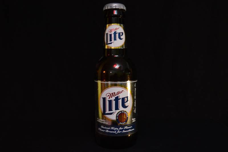lot 102 image: Miller Large Bottle Decor