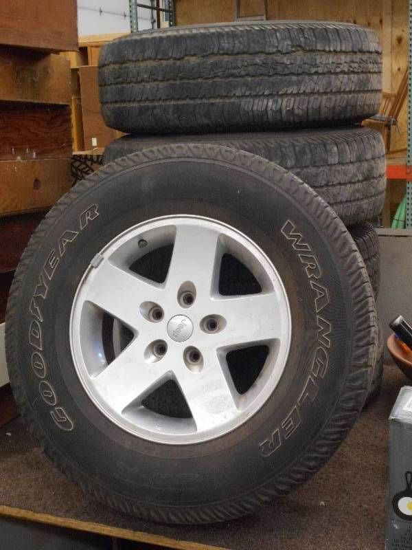 lot 92 image: (5) Jeep 5-Lug Wheels With Goodyear...