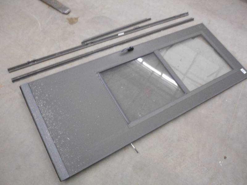lot 105 image: (1) 32 Storm Door Set ...