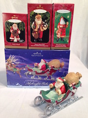 Hallmark Santa Themed Ornaments & Sled